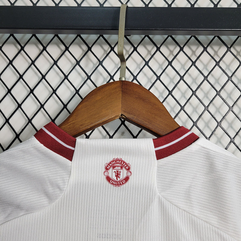 Conjunto Infantil Manchester United lll 2023/24 Branco - Modelo Torcedor