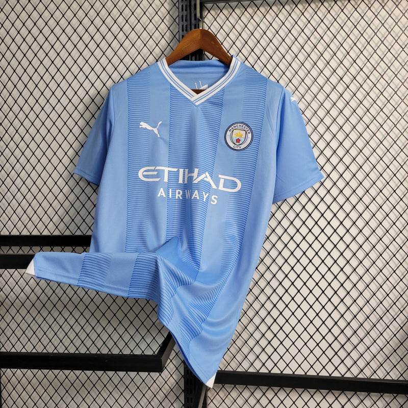 Camisa Manchester City l 2023/24 Azul - Modelo Torcedor